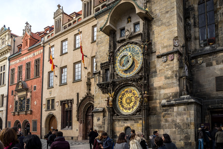 PRAGUE, CZECH REPUBLIC - MARCH 5, 2016: Unidentified tourists in the Old Town Square in front of Tyn Church and famous Astronomical Clock, Prague Czech, on March 5, 2016のeditorial素材