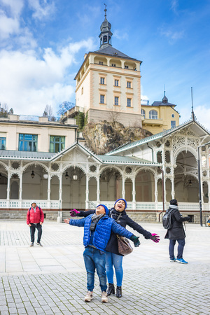 PRAGUE, CZECH REPUBLIC - MARCH 4, 2016: Asian boy and mom are travel in termal mineral spring in Karlovy Vary, Czech Republic on March 4, 2016のeditorial素材