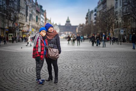 PRAGUE, CZECH REPUBLIC - MARCH 5, 2016: Asian boy and mom are travel in old town on Prague, Czech Republic. on March 5, 2016のeditorial素材