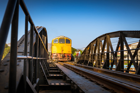 KANCHANABURI, THAILAND - December 29, 2016: Train go on the bridge of river Kwai in Kanchanaburi, Thailand. The bridge was built by the Japanese Army during World War II. Nowadays is a famous tourist destination of the world.のeditorial素材