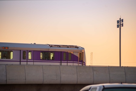 Nonthaburi, Thailand - April 22:  MRT sky train Purple Line is running on the evening. view from Central plaza westgate car park. on April 22, 2017 in Nonthaburi, Thailand.のeditorial素材