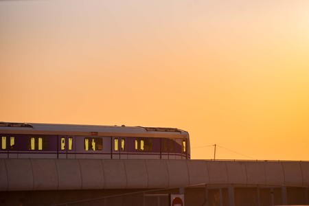 Nonthaburi, Thailand - April 22:  MRT sky train Purple Line is running on the evening. view from Central plaza westgate car park. on April 22, 2017 in Nonthaburi, Thailand.のeditorial素材