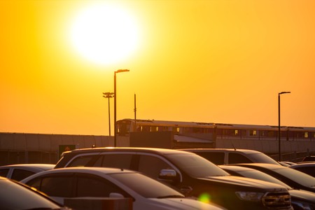 Nonthaburi, Thailand - April 22:  MRT sky train Purple Line is running on the evening. view from Central plaza westgate car park.のeditorial素材