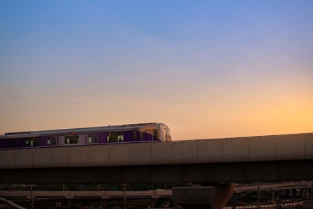 Nonthaburi, Thailand - April 22:  MRT sky train Purple Line is running on the evening. view from Central plaza westgate car park.のeditorial素材