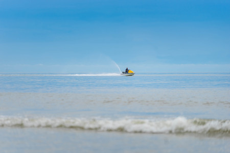 HUA HIN, THAILAND - MAY 28, 2017: Unidentified man driving jet ski activities on the sea at Hua hin beach of Thailand.のeditorial素材