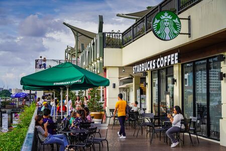 BANGKOK, THAILAND - MAY 1, 2018: Starbucks coffee shop riverside of chaopraya at Tha Maharaj in Bangkok, Thailand.のeditorial素材
