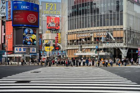 SHIBUYA, TOKYO, JAPAN - OCTOBER 16, 2018: Shibuya Crossing, One of the world's most used pedestrian scrambles, at Hachiko Square in Shibuya,のeditorial素材