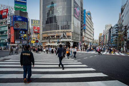 SHIBUYA, TOKYO, JAPAN - OCTOBER 16, 2018: Shibuya Crossing, One of the world's most used pedestrian scrambles, at Hachiko Square in Shibuya,のeditorial素材