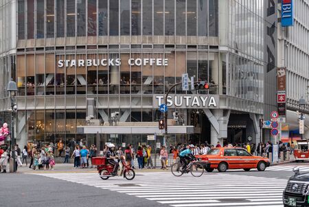 SHIBUYA, TOKYO, JAPAN - OCTOBER 16, 2018: Tsutaya and stabucks at shibuya crossing.のeditorial素材