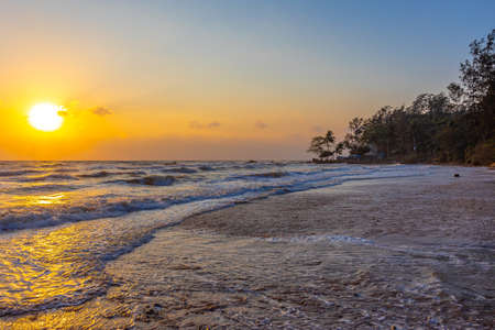 Beautiful sea waves in the morning sunrise.の写真素材