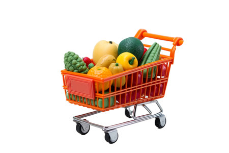 Shopping cart with fruits and vegetables isolated on a white background.の素材