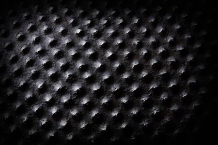 fine close up image of dot black metal background