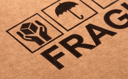 fine image close up of fragile symbol on cardboard selective focusの写真素材