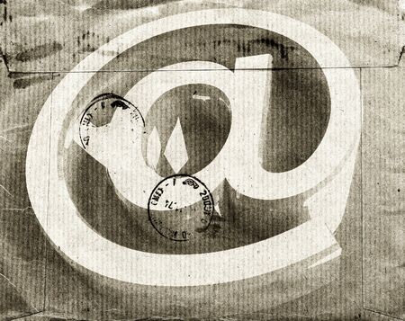 fine image of grunge email symbol on vintage envelopeの写真素材
