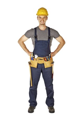 confident young manual worker isolated on white backgroundの写真素材