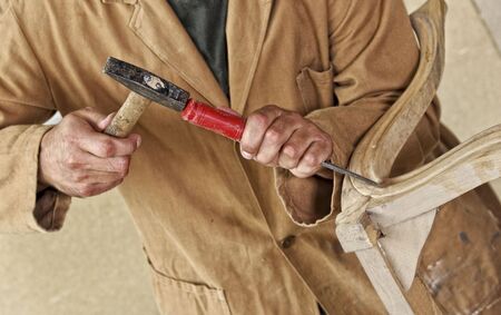 fine detail of caucasian carpenter at workの写真素材