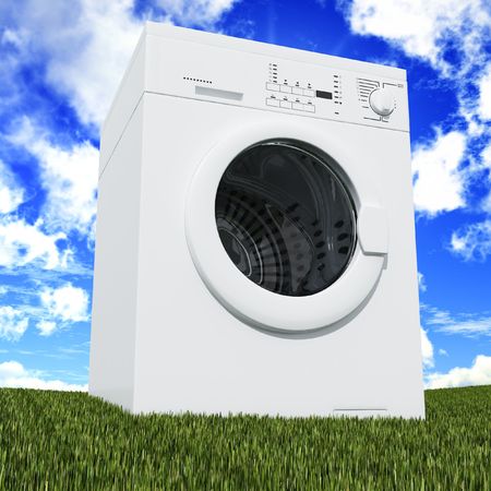 fine 3d washing machine with blue cloudy sky and green grassの写真素材