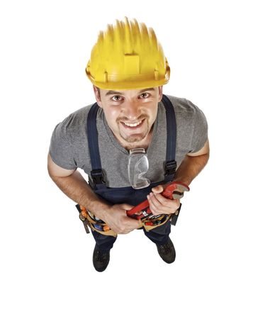smiling manual worker standing , view from above isolated on whiteの写真素材