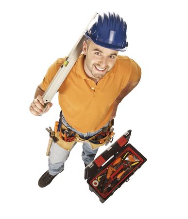young constructor worker with spirit level and toolbox isolated on whiteの写真素材