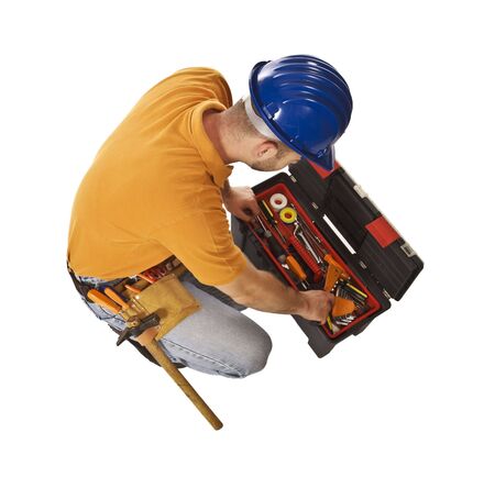 young caucasian mantool isolated on white with toolbox, view from aboveの写真素材