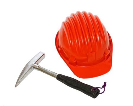 isolated adventure tool, red helmet and hammerの写真素材