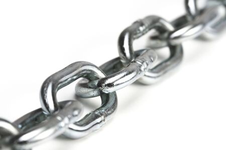 close up image of iron chain on white board
