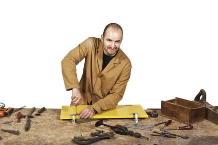 craftsman at work isolated on white backgroundの写真素材