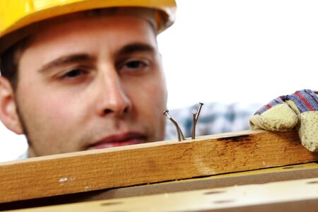 young manual worker has a little problem during his work. Selective focus imageの写真素材