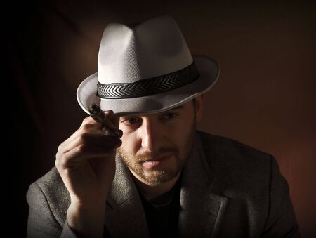 fine image of caucasian smoking man portrait vintage styleの写真素材