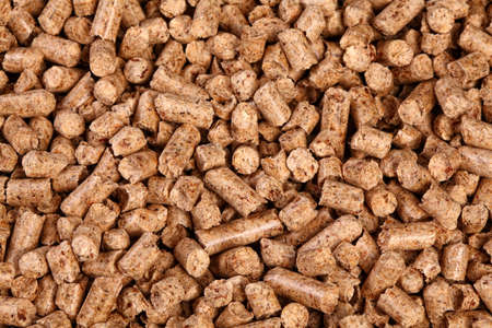 close up image of natural wood pellet background