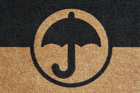 cardboard umbrella mark fine closeup image backgroundの写真素材