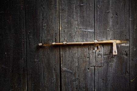 old wood door and iron lockerの写真素材