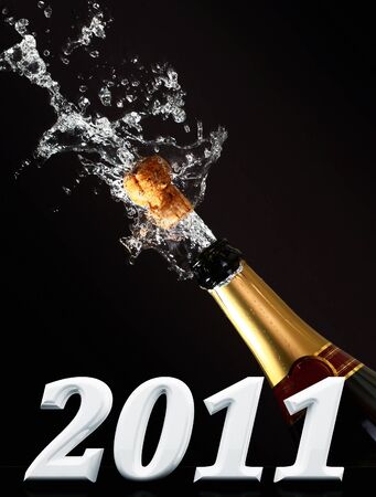 champagne bottle with shotting cork and 2011 text