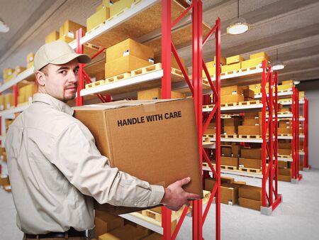 young delivery man at work in a classic warehouse