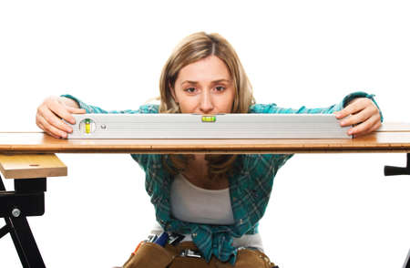 detail of carpenter with spirit level