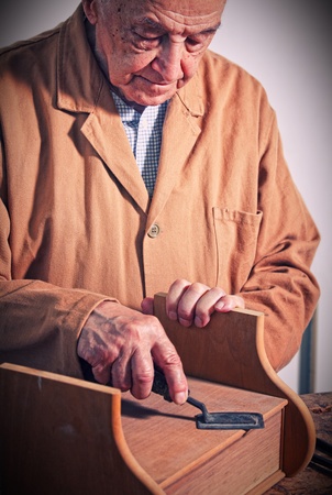 fine portrait of aged craftmanの写真素材