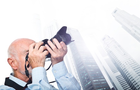 portrait of senior photographer and singapore backgroundの写真素材