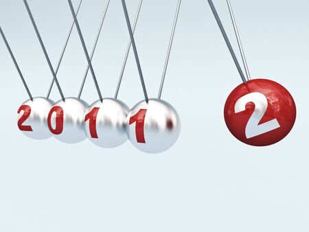 3d image of newton cradle with 2012 text