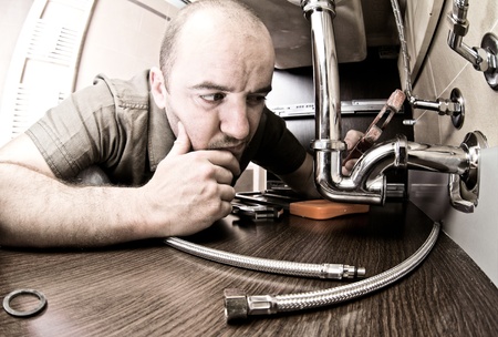 plumber thinking how to fixの写真素材
