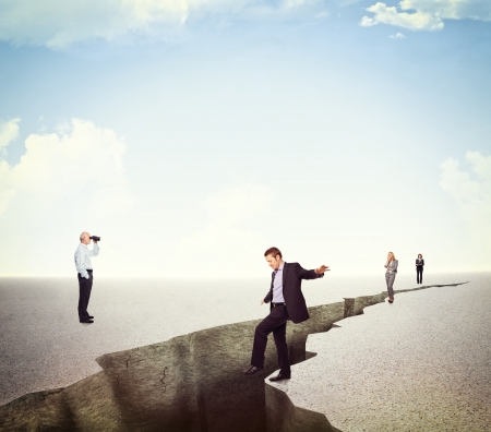 business people and huge ground crackの写真素材