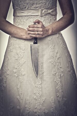 detail of bride holding sharp knifeの写真素材
