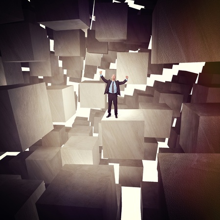 businessman and 3d concrete cubes backgroundの写真素材
