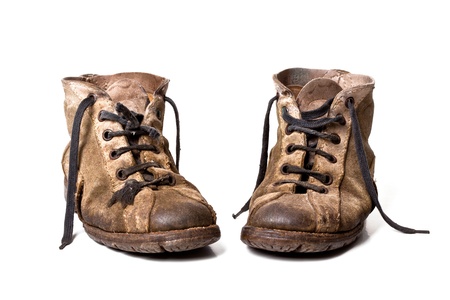 old shoes isolated on white backgroundの写真素材