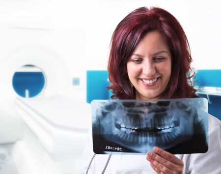 smiling doctor and hospital background