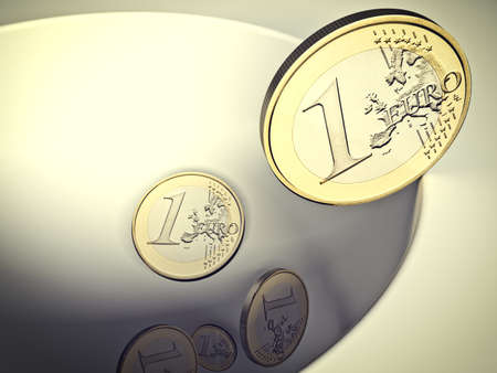 3d image of euro coin falling in a holeの写真素材