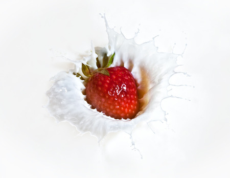 red  Strawberry splash in milk の写真素材