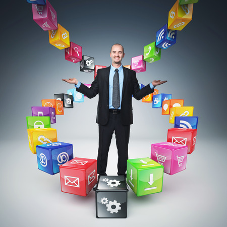 business man  on abstract icons cubesの写真素材