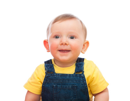 portrait of caucasian bay playing with toy