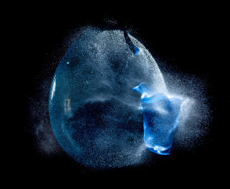 explosion of balloon full of water high speed photographyの写真素材