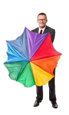 happy businessman with rainbow umbrella isolated on whiteの写真素材